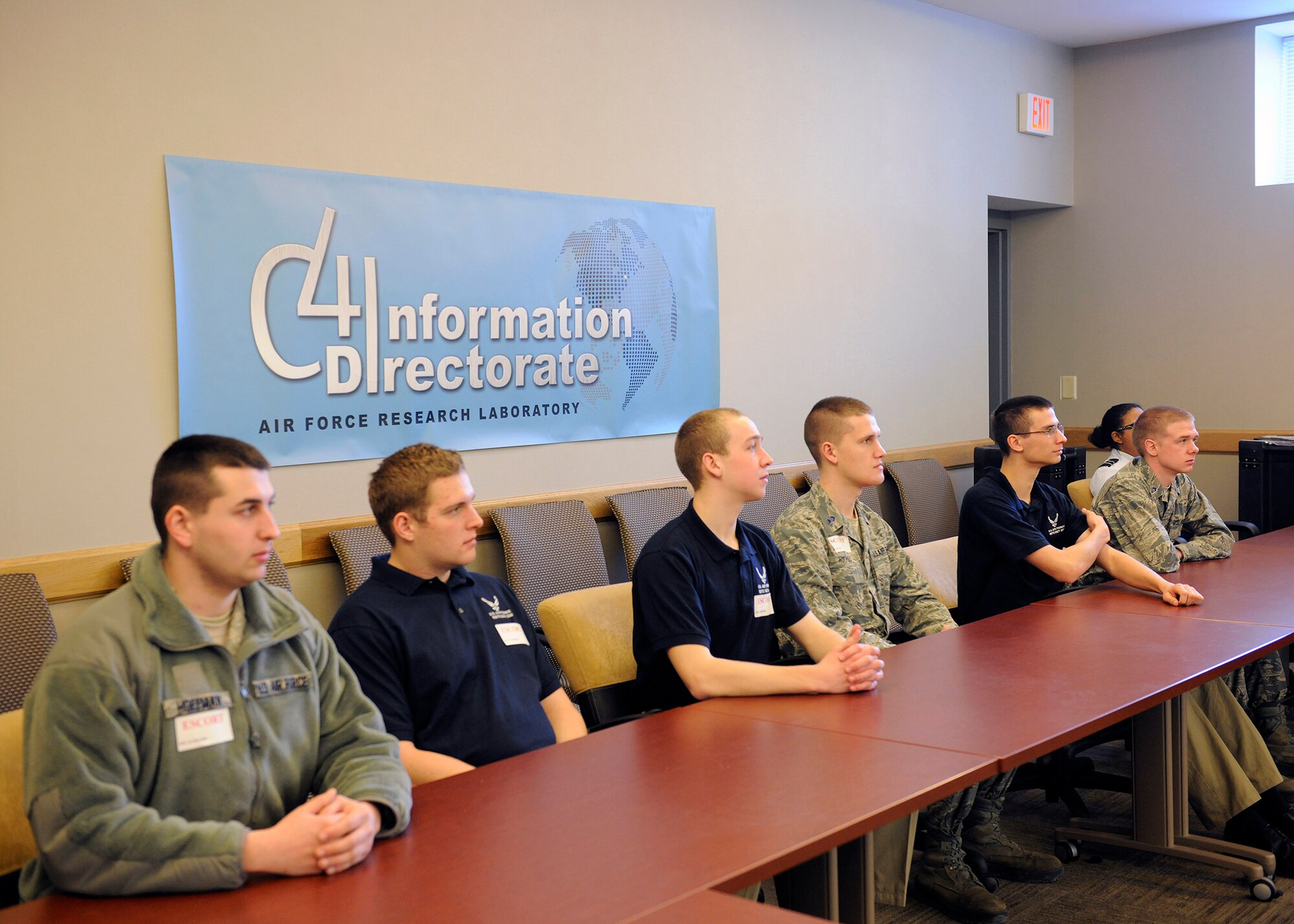 Cadets listen in during a cyber information briefing while visiting the Information Directorate.