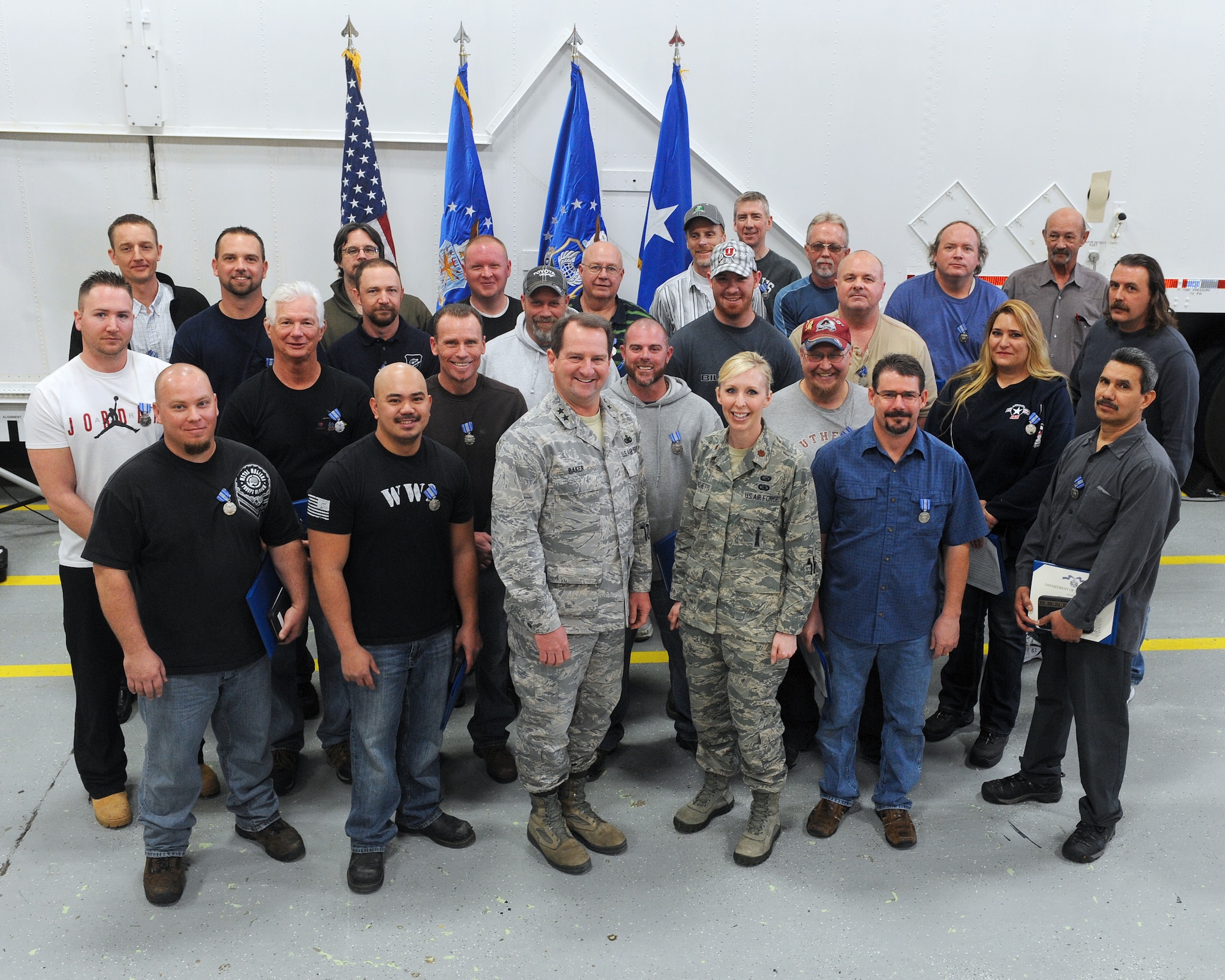 The Civilian Achievement Medal was recently awarded to members of the 581st Missile Maintenance Squadron at Hill Air Force Base. According to the award citation, members of the heavy mobile equipment mechanic team exhibited outstanding performance, professional competence, and ceaseless efforts, which resulted in unprecedented performance in the transporter erector programmed depot maintenance. (U.S. Air Force photo by Alex R. Lloyd)