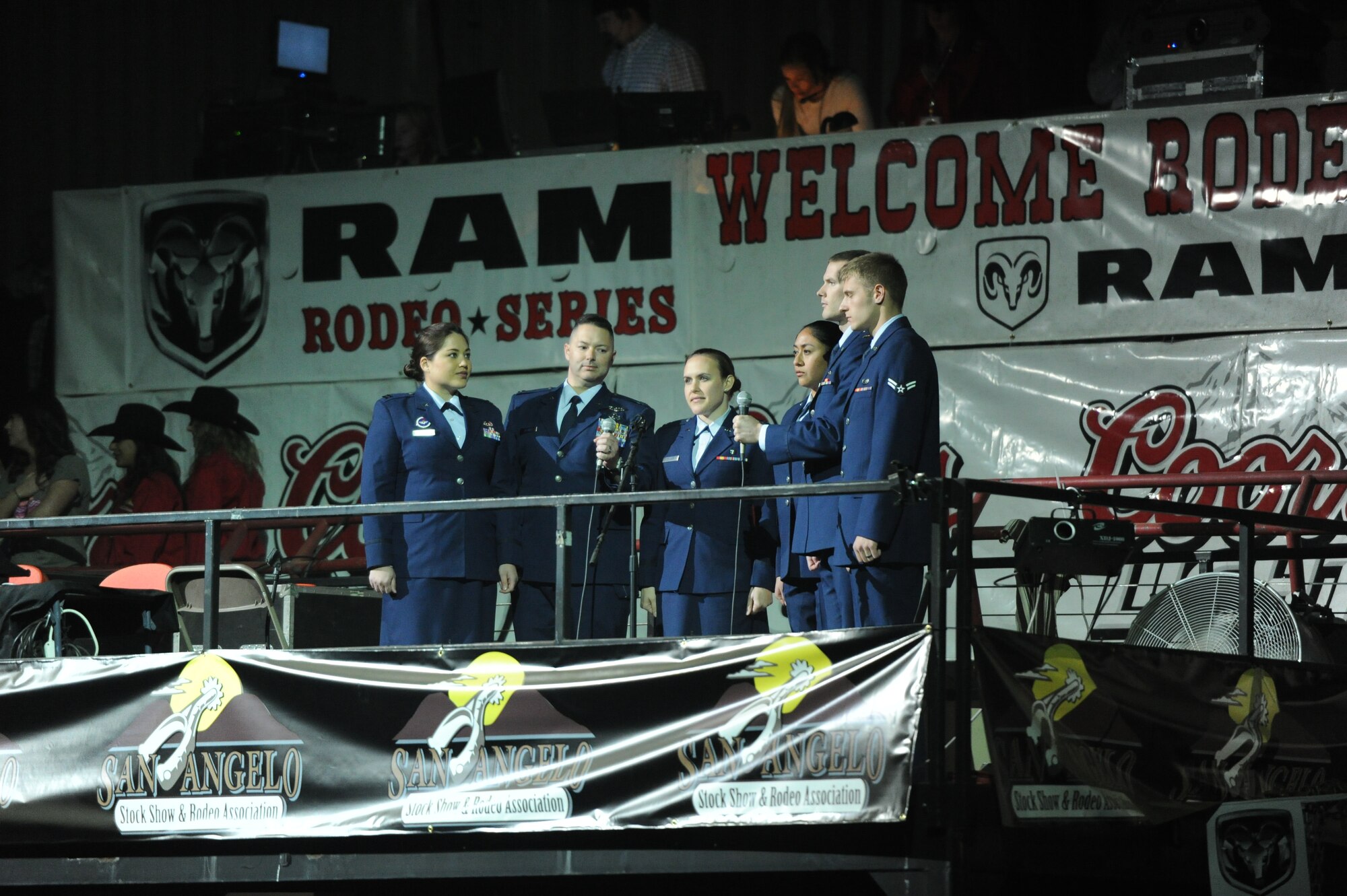 SAN ANGELO, Texas – Goodfellow Air Force Base’s Patriotic Blue sings the national anthem at the beginning of the San Angelo Stock Show and Rodeo’s Military Appreciation Night at the Foster Communication Coliseum here Feb. 26. The night included a presentation of the service flags by the San Angelo Stock Show and Rodeo Drill Team ambassadors. (U.S. Air Force photo/ Laura R. McFarlane)