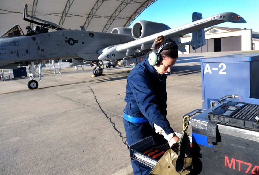 U.S. Air Force Senior Airman Grace Wheeler, 74th Aircraft Maintenance Unit crew chief, checks the tool drawer at Moody Air Force Base, Ga., March 14, 2014. Wheeler checks that no tool is left behind ensuring a safe flight for the pilot. (U.S. Air Force photo by Senior Airman Olivia Bumpers/Released)