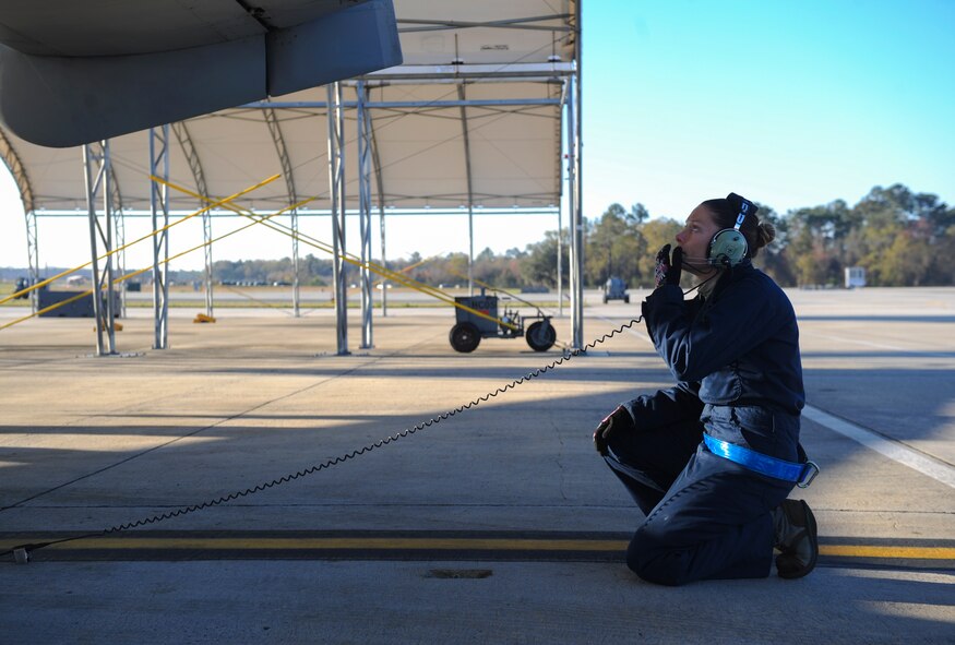U.S. Air Force Senior Airman Grace Wheeler, 74th Aircraft Maintenance Unit crew chief, performs pre-flight inspections at Moody Air Force Base, Ga., March 14, 2014. During pre-flight inspections, crew chiefs check the serviceability of the aircraft by checking the tires and looking for cracks or leaks. (U.S. Air Force photo by Senior Airman Olivia Bumpers/Released)