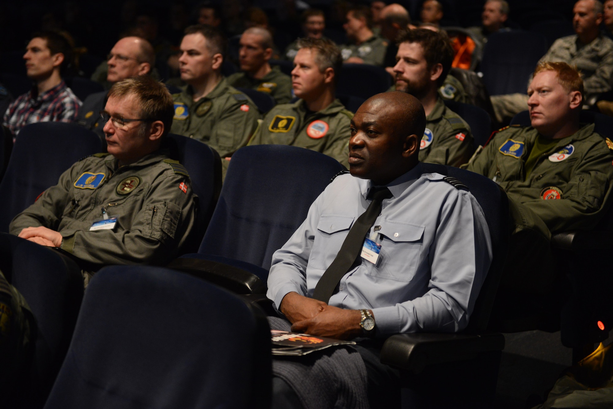 RAMSTEIN AIR BASE, Germany – Wing Commander Ayodeji Talabi, a consultant in occupational medicine with the Royal Air Force, listens to a presentation during the 29th Annual Aerospace Medicine Summit and NATO Science and Technology Organization Technical Course at the Hercules Theater here March 10, 2014. Talabi said he’s been trying to attend the summit for the past four years and is thrilled to finally have the opportunity to take part in the event. He joined more than 170 medical professionals from 16 nations at the summit. (U.S. Air Force Photo by Tech. Sgt. James M. Hodgman)