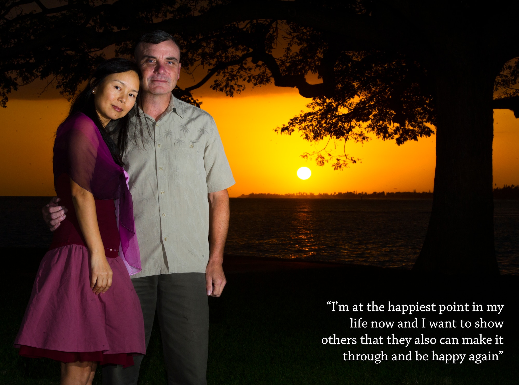 Col. Robert Swanson stands with his wife Sunny, March 4, 2014, at Foster's Point, Joint Base Pearl Harbor-Hickam, Hawaii. Swanson recently came forward to share how he learned to face life's challenges during difficult times and how he is happier now than ever. Swanson is the Pacific Air Forces Weather Branch chief. (U.S. Air Force illustration/Staff Sgt. Nathan Allen)