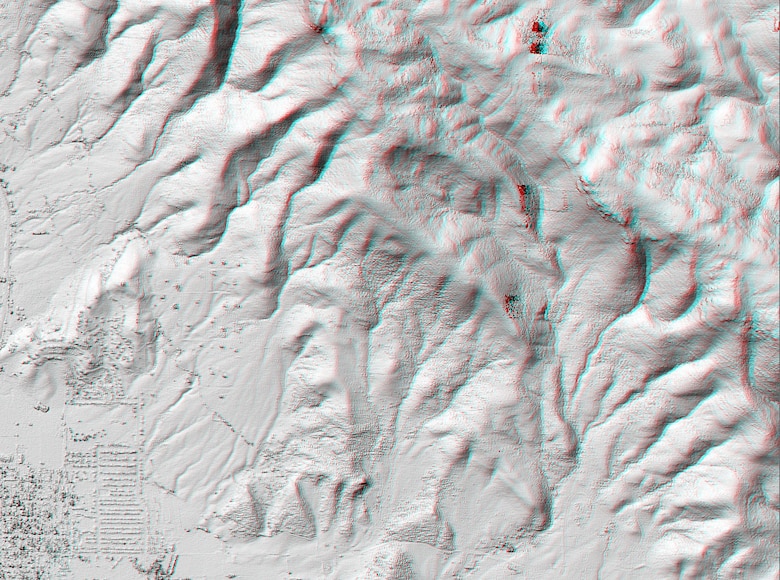 This anaglyphic stereo image uses USACE HyperCube to apply a shaded relief to Digital Elevation Matrix (DEM) data using a Sun elevation of 45 degrees at an azimuth of 135 degrees.