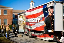 Marines with the 2nd Marine Logistics Group wait in line to donate blood in front of the 2nd MLG headquarters building aboard Marine Corps Base Camp Lejeune, N.C., March 14, 2014. Each Marine donated one pint of blood, which can save up to three lives. 