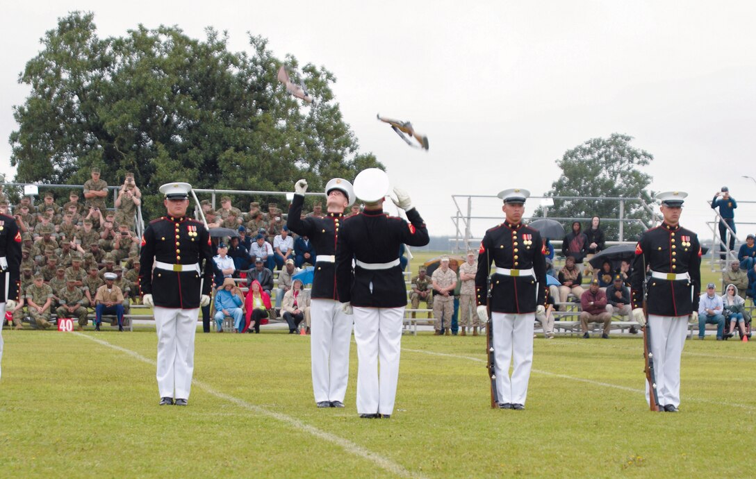 In spite of Monday’s rainy conditions, roughly 2,200 spectators from the local and surrounding communities watched the Marine Corps Silent Drill Platoon’s, the Marine Corps Color Guard’s and “The Commandant’s Own” Marine Corps Drum and Bugle Corps’ dazzling performances at the Battle Color Detachment Ceremony at Marine Corps Logistics Base Albany. 
The event showcased the Marine Corps as well as allowed it to show its appreciation to the community, according to Col. Don Davis, commanding officer, MCLB Albany. 
“This is a great opportunity for our Marines to see some of their own they have never seen before and it is also a great opportunity to show our appreciation to Albany,” Davis said. 

