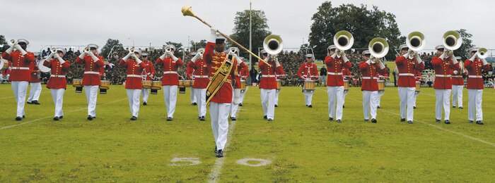 In spite of Monday’s rainy conditions, roughly 2,200 spectators from the local and surrounding communities watched the Marine Corps Silent Drill Platoon’s, the Marine Corps Color Guard’s and “The Commandant’s Own” Marine Corps Drum and Bugle Corps’ dazzling performances at the Battle Color Detachment Ceremony at Marine Corps Logistics Base Albany. 
The event showcased the Marine Corps as well as allowed it to show its appreciation to the community, according to Col. Don Davis, commanding officer, MCLB Albany. 
“This is a great opportunity for our Marines to see some of their own they have never seen before and it is also a great opportunity to show our appreciation to Albany,” Davis said.
