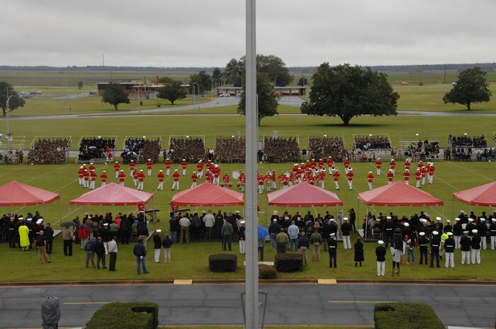 In spite of Monday’s rainy conditions, roughly 2,200 spectators from the local and surrounding communities watched the Marine Corps Silent Drill Platoon’s, the Marine Corps Color Guard’s and “The Commandant’s Own” Marine Corps Drum and Bugle Corps’ dazzling performances at the Battle Color Detachment Ceremony at Marine Corps Logistics Base Albany. 
The event showcased the Marine Corps as well as allowed it to show its appreciation to the community, according to Col. Don Davis, commanding officer, MCLB Albany. 
“This is a great opportunity for our Marines to see some of their own they have never seen before and it is also a great opportunity to show our appreciation to Albany,” Davis said.
