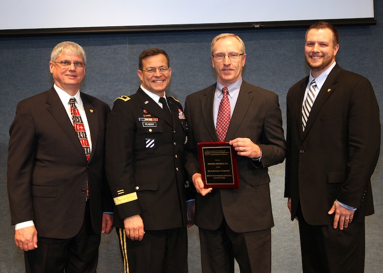 Maj. Gen. John W. Peabody (Second from Left), U.S. Army Corps of Engineers deputy commanding general for Civil and Emergency Operations; Robert A. Green, president of the National Society of Professional Engineers (Left), and David Scott Wolf, NSPE board member; pose with Mike Zoccola, chief of the Nashville District Civil Design Branch, during the Federal Engineer of the Year Banquet Feb. 20, 2014 at the National Press Club in Washington D.C.  Zoccola, the 2013 Corps of Engineers Engineer of the Year, was honored as one of 10 finalists for the FEYA by the National Society of Professional Engineers.