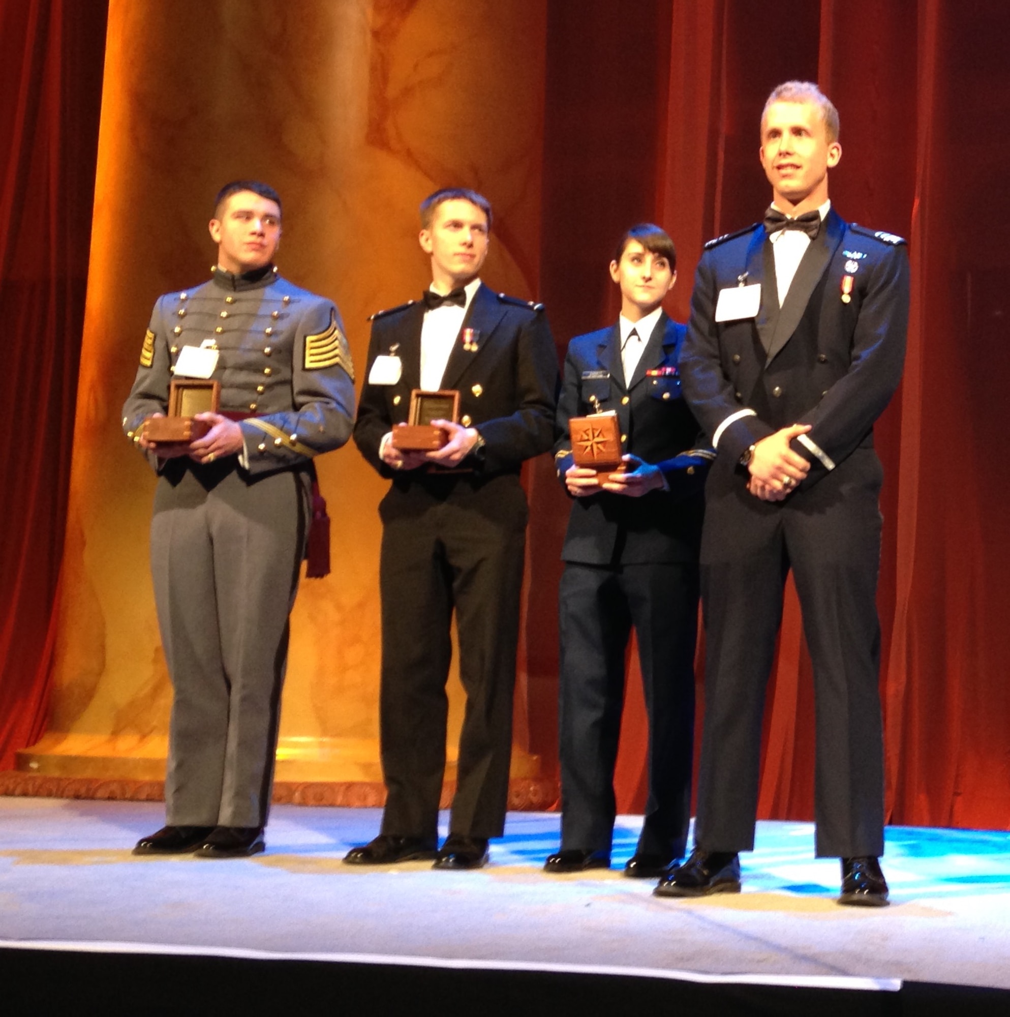 Cadet 1st Class Christopher Shannon (right) receives the 2014 Tomorrow's Leaders Award during the 57th Annual Laureates Awards March 6 in Washington, D.C. Shannon is the Academy Aeronautics Department's top cadet; he holds a 3.98 grade point average and is in the top 1 percent on the 2014 graduating class. (Air Force courtesy photo) 
