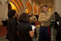 Capt. Chad Luebke, Officer Selection Officer at Recruiting Station Milwaukee, speaks with law students about a possible career as a Marine Corps Judge Advocate during the 46th annual National Black Law Students Association Convention, Mar. 14, 2014.