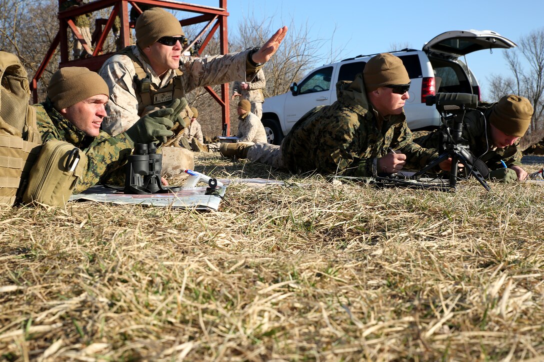 Camp Atterbury, Ind. – Fire-support team Marines conduct target sighting, location and call-for-fire training during their Reserve forces drill period, March 15, 2014, at a firing range on Camp Atterbury Joint Maneuver Center. A FiST consists of Marines from indirect-fire units such as mortars and artillery, who locate and direct the units toward enemy targets. The Marines are with Weapons Company, 2nd Battalion, 24th Marine Regiment, 4th Marine Division. (Marine Corps photo by Cpl. J. Gage Karwick/released)