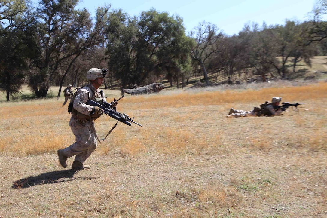 Marines with 2nd Battalion, 1st Marines, 11th Marine Expeditionary Unit execute fire and maneuver tactics training during Realistic Urban Training Marine Expeditionary Unit (RUTMEUEX) at Fort Hunter Liggett, Calif., March 15. RUTMEUEX is the first opportunity for all the elements of the MEU to integrate with one another. Marines are placed in realistic environments to simulate conditions they might see on the MEU’s scheduled deployment.     
(Marine Corps photo by Cpl. Demetrius Morgan/RELEASED)