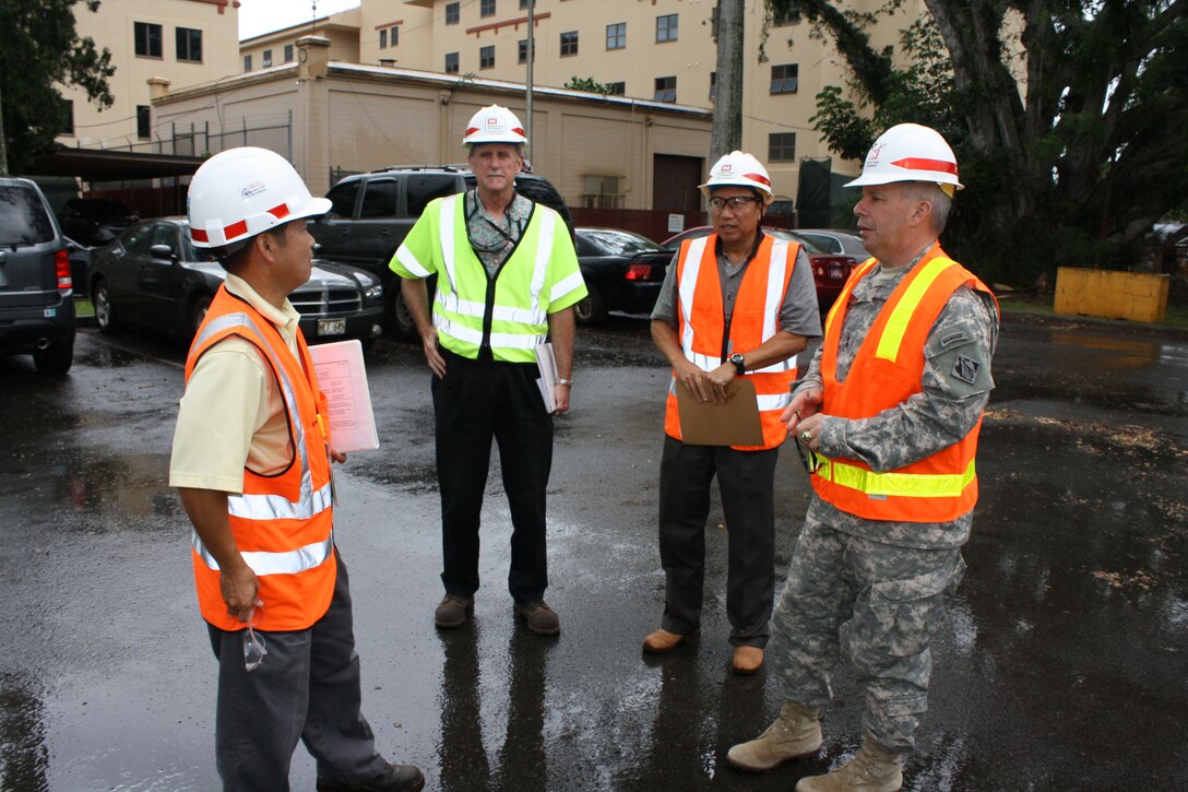 Maj. Gen. Todd T. Semonite, U.S. Army Corps of Engineers Deputy Commander and Deputy Chief of Engineers (right), visited the Honolulu District Schofield Barracks Area Office, met members of our Ohana, and then toured the Warriors in Transition project on March 10. Here he talks with (left to right)SBAO Resident Engineer Jason Tanaka, Chief, Engineering and Construction Todd Barnes and SBAO Area Engineer Dickson Ma prior to touring the WIT project site.  