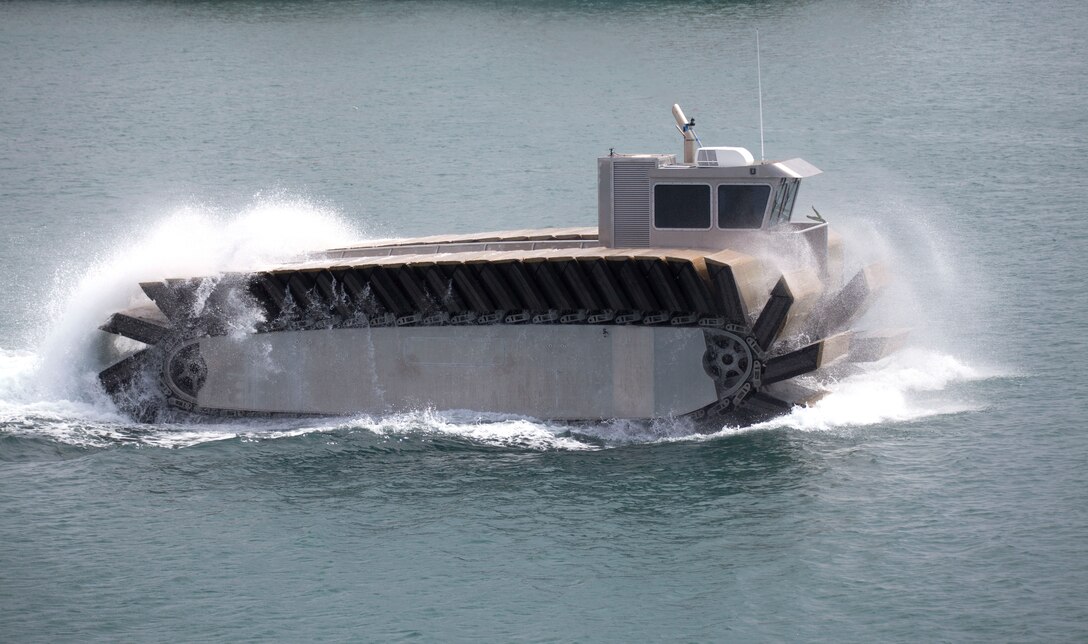 HONOLULU - The Ultra Heavy-lift Amphibious Connector (UHAC) propels through the Honolulu Harbor here, March 3, during its first-ever speed observation. The UHAC is a new development intended to enhance shore access and load capabilities during ship-to-shore operations.