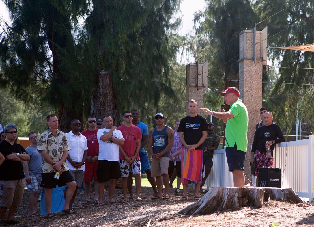 Lt. Gen. Terry G. Robling, commander of U.S. Marine Corps Forces, Pacific, speaks to MarForPac Marines and their families during the 2014 MarForPac Family Day at Turtle Cove here, March 14. The family day's intent was to raise unit morale and give Marines a day of relaxation for all their hard work.