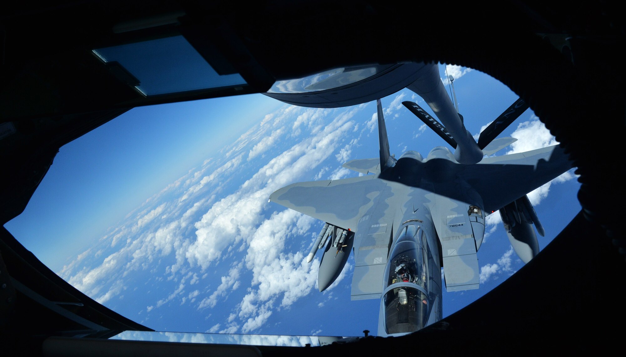 An F-15 Eagle from the Massachusetts Air National Guard prepares to receive fuel during an in-air refueling near Joint Base Pearl Harbor-Hickam, Hawaii, March 14, 2014. The F-15 participated in a Warrior Day training exercise as part of Sentry Aloha, an air-to-air exercise that allowed participants to practice offensive and defensive wartime tactics. (U.S. Air Force photo/Staff Sgt. Alexander Martinez)