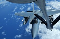 An F-15 Eagle from the Massachusetts Air National Guard prepares to receive fuel during an in-air refueling near Joint Base Pearl Harbor-Hickam, Hawaii, March 14, 2014. The F-15 participated in a Warrior Day training exercise as part of Sentry Aloha, an air-to-air exercise that allowed participants to practice offensive and defensive wartime tactics. (U.S. Air Force photo/Staff Sgt. Alexander Martinez)