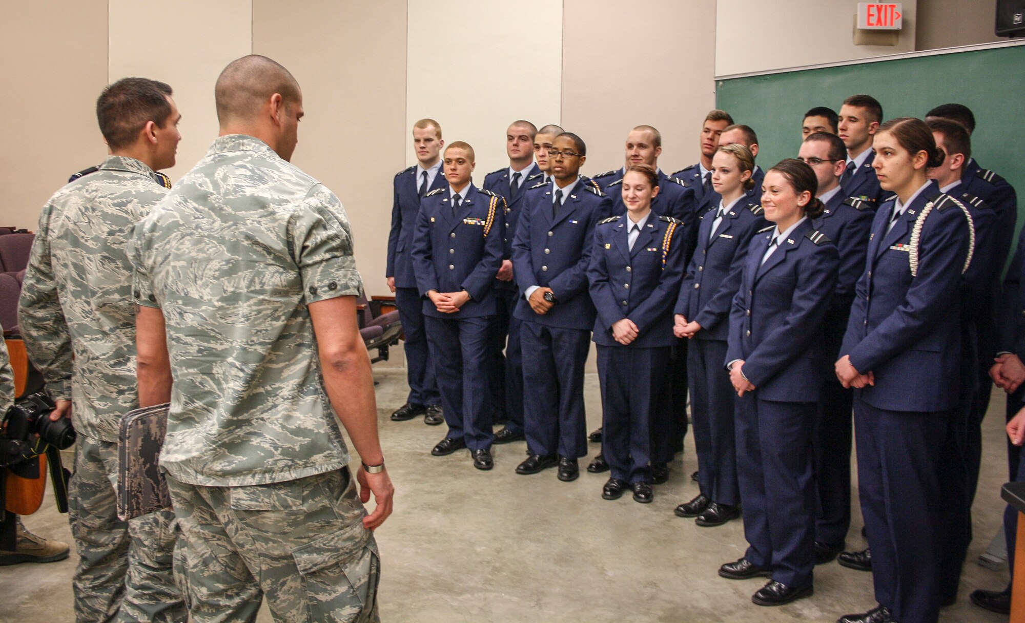 1st Lts. Matt Sanders and Benjamin Pritchard, Fairchild company grade officers, give advice to Field Training Preparation cadets at the University of Idaho’s Air Force Reserve Officer Training Corps Detachment 905 in Moscow, Idaho, March 13, 2014. Fairchild air Force Base, Wash., officers spoke with the cadets about their Air Force jobs and the transition from ROTC to active duty for the detachment’s career day. (U.S. Air Force photo by Cadet Molly A. Wakeling/Released)