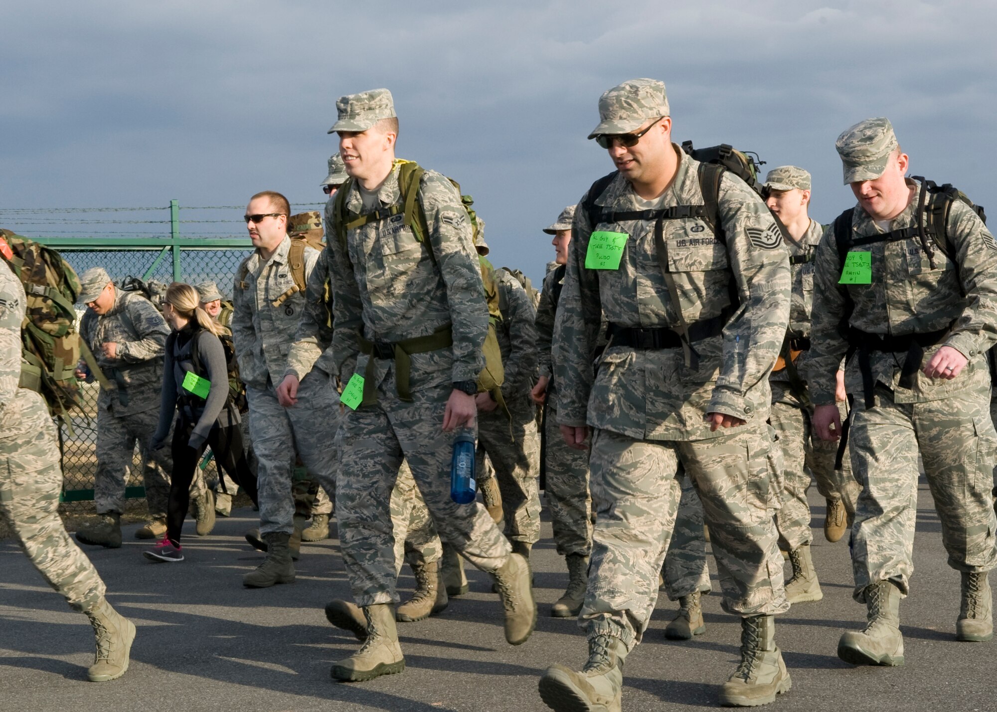 Team Dover Airmen walk out of the starting gate March 15, 2014, during the 15th Annual 436th Security Forces Ruck March at Dover Air Force Base, Del. A total of 41 teams and 165 runners participated in the event. (U.S. Air Force photo/Airman 1st Class Zachary Cacicia)