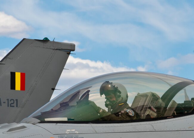 A Belgian air force pilot prepares to taxi an F-16 Fighting Falcon during Red Flag 14-2, March 13, 2014, at Nellis Air Force Base, Nev. Red Flag provides aircrews and support operations members from various air frames, military services and allied countries the opportunity to integrate and practice combat operations over the Nevada Test and Training Range. (U.S. Air Force photo by Airman 1st Class Thomas Spangler)
