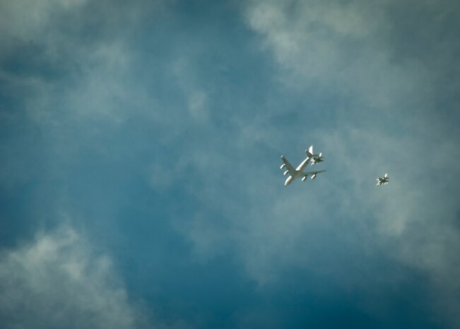 A KC-135 Stratotanker refuels an F-16 Fighting Falcon during Red Flag 14-2 March 13, 2014, over the Nevada Test and Training Range. Red Flag provides aircrew members an opportunity to experience realistic, stressful combat situations in a controlled environment in preparation for any future conflicts. (U.S. Air Force photo by Airman 1st Class Timothy Young)