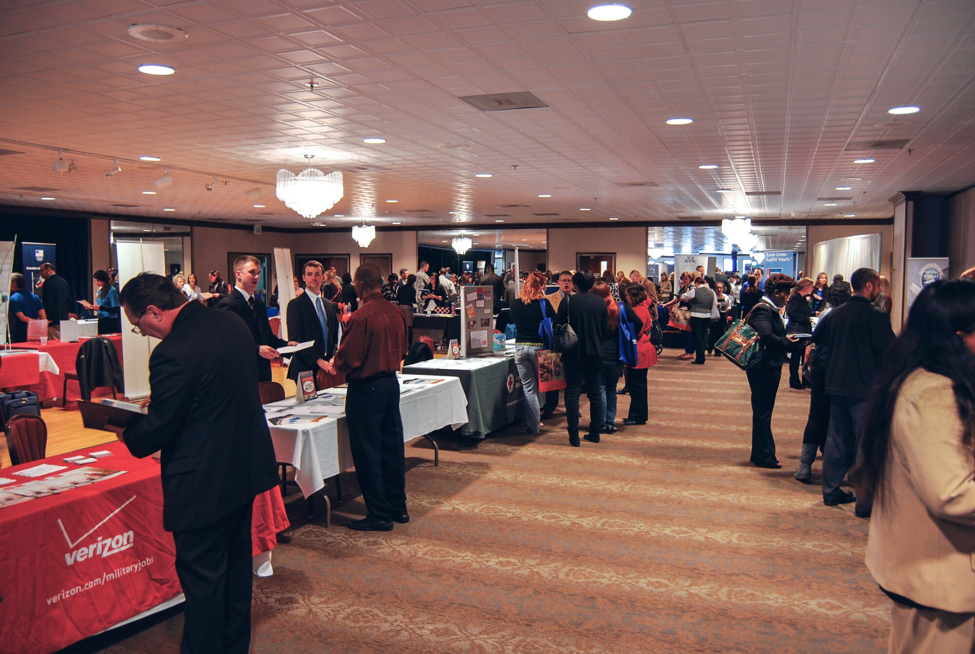 PETERSON AIR FORCE BASE, Colo. – Hiring Our Heroes, a U.S. Chamber of Commerce Foundation in conjunction with Military Spouse Employment Partnership, organized and held a job fair in the Club ballroom March 12. With a registration of nearly 300 people, the Hiring Our Heroes job fair was an event for military spouses and service members to mingle, exchange information and see what opportunities are available in the private sector, as well as learn about what employers are searching for in job candidates. (U.S. Air Force photo/Michael Golembesky)