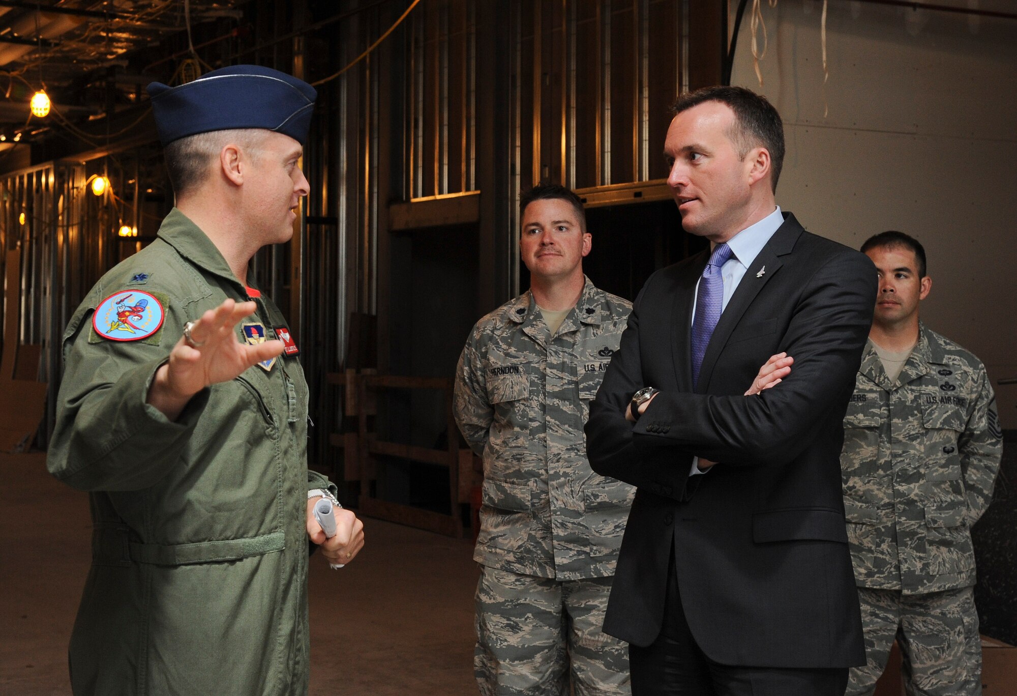 Undersecretary of the Air Force Eric Fanning is briefed by Lt. Col. Matthew Liljenstolpe, 56th Training Squadron commander, during a tour of the Academic Training Center construction site on March 14 at Luke Air Force Base. The 145,000 square-foot facility will include pilot academic training classrooms, 12 F-35 simulators, a secured briefing auditorium, and space for administrative, instructor and engineering personnel. Estimated completion date for the building is fall of 2014. Fanning was at Luke for the unveiling of the wing’s first F-35 Lightning II fighter jet. (U.S. Air Force photo by Staff Sgt. Darlene Seltmann)