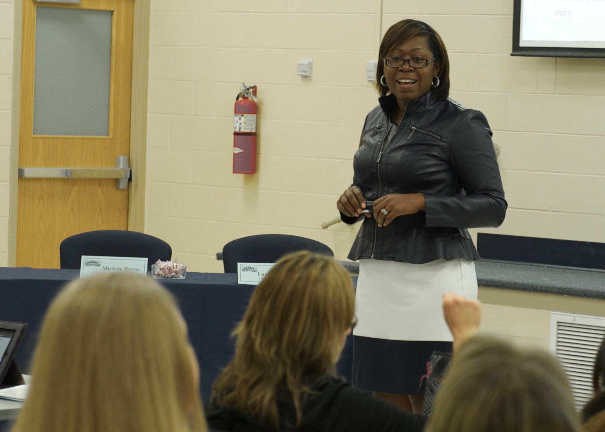 TaShara Duckett, a community readiness specialist with the Airman and Family Readiness Center, leads a "Career Coaching Corner" session during the Spouse Career Explosion March 13 at Eglin Air Force Base, Fla. The two-day event was hosted by the A&FRC for military spouses seeking employment and career resources in order to compete in today’s job market. (U.S. Air Force photo/Sara Vidoni)