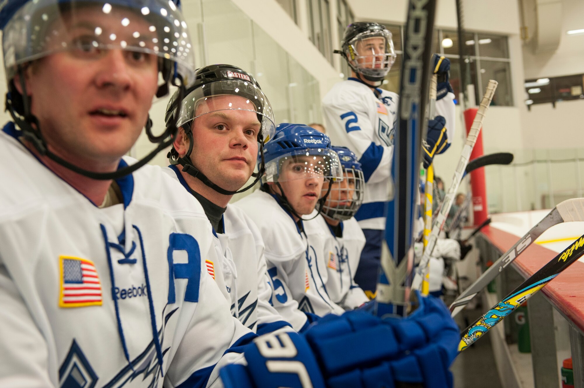 The White squad watches in dismay as they are scored on during a Blue vs. White Fairchild Falcons Varsity Hockey team game at Eastern Washington University’s University Recreation Center in Cheney, Wash., March 14, 2014. (U.S. Air Force photo by Staff Sgt. Benjamin W. Stratton/Released)