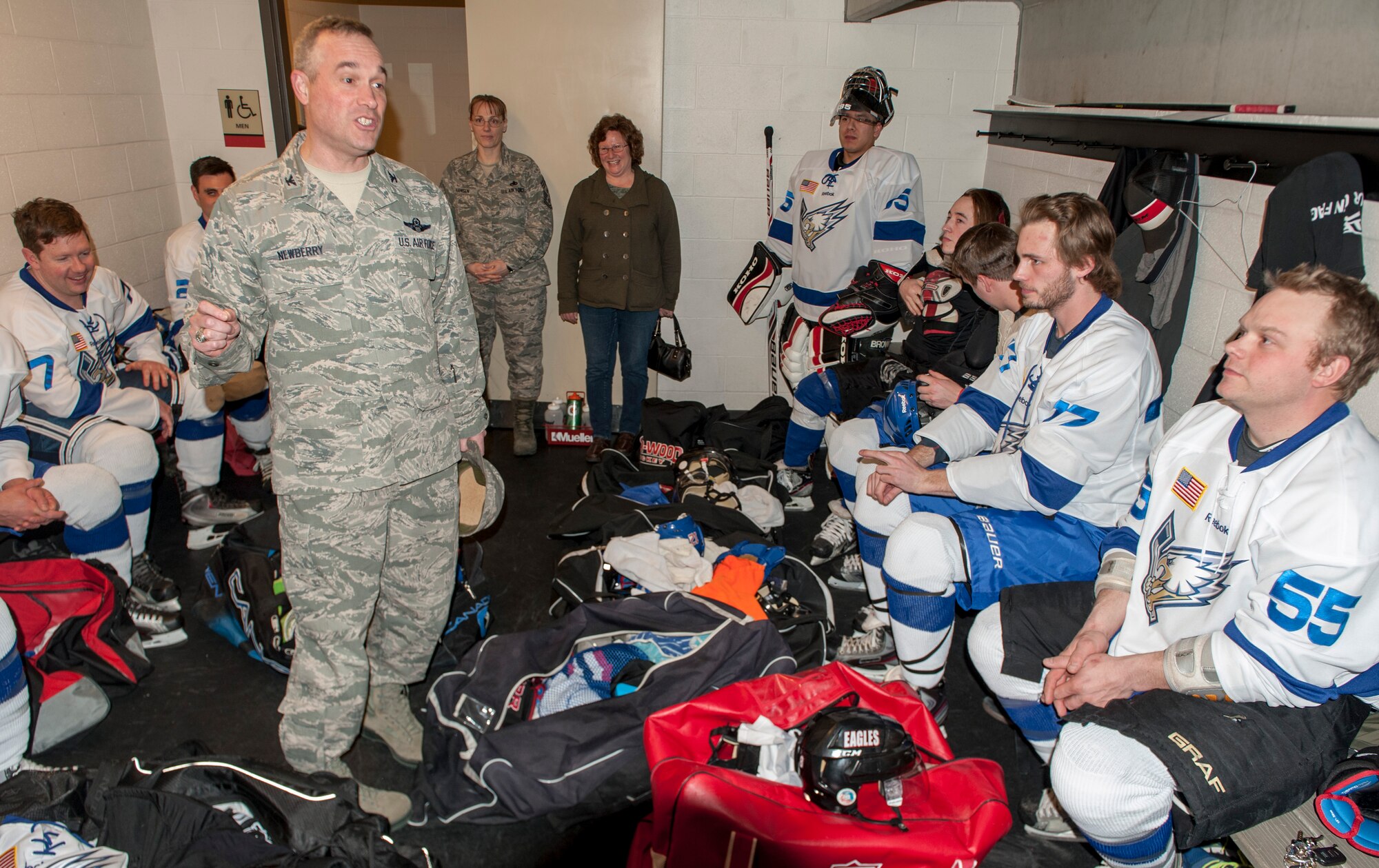 Col. Brian Newberry gives a pep talk to his team before a Blue vs. White hockey matchup at Eastern Washington University’s University Recreation Center in Cheney, Wash., March 14, 2014. Newberry is the 92nd Air Refueling Wing commander. (U.S. Air Force photo by Staff Sgt. Benjamin W. Stratton/Released)