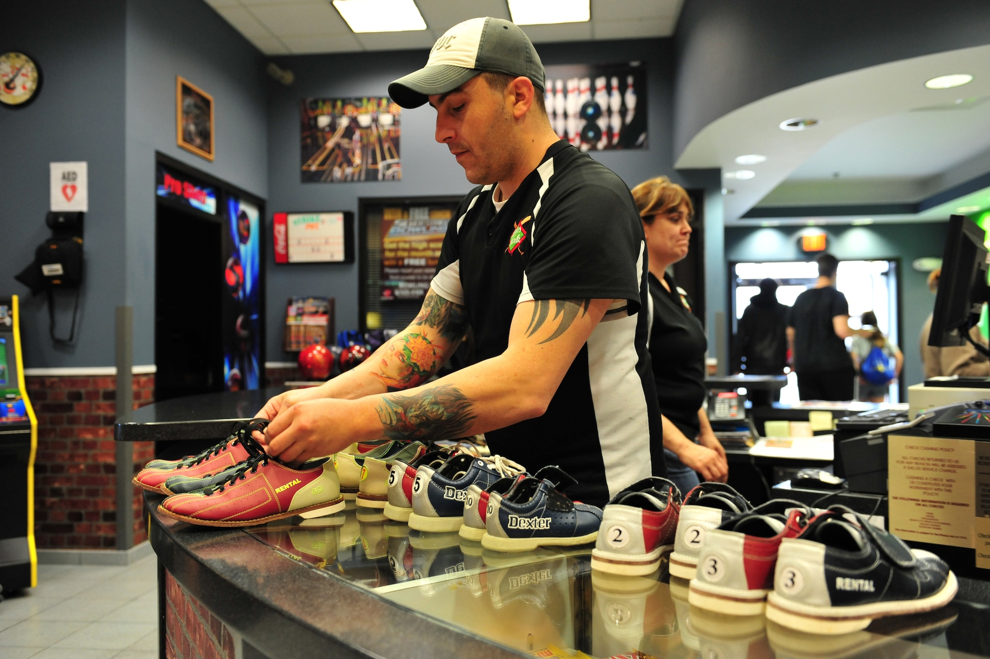 The Lajes Bowling Center's team of professionals are vital to the 65th Force Support Squadron's success. For the second year in a row, the 65th FSS was awarded the Maj. Gen. Eugene L. Eubank Award at the Air Force level for 2013. They won the same award at the U.S. Air Forces in Europe level in 2011, 2012 and 2013. (U.S. Air Force photo by Tech. Sgt. Chenzira Mallory/released)