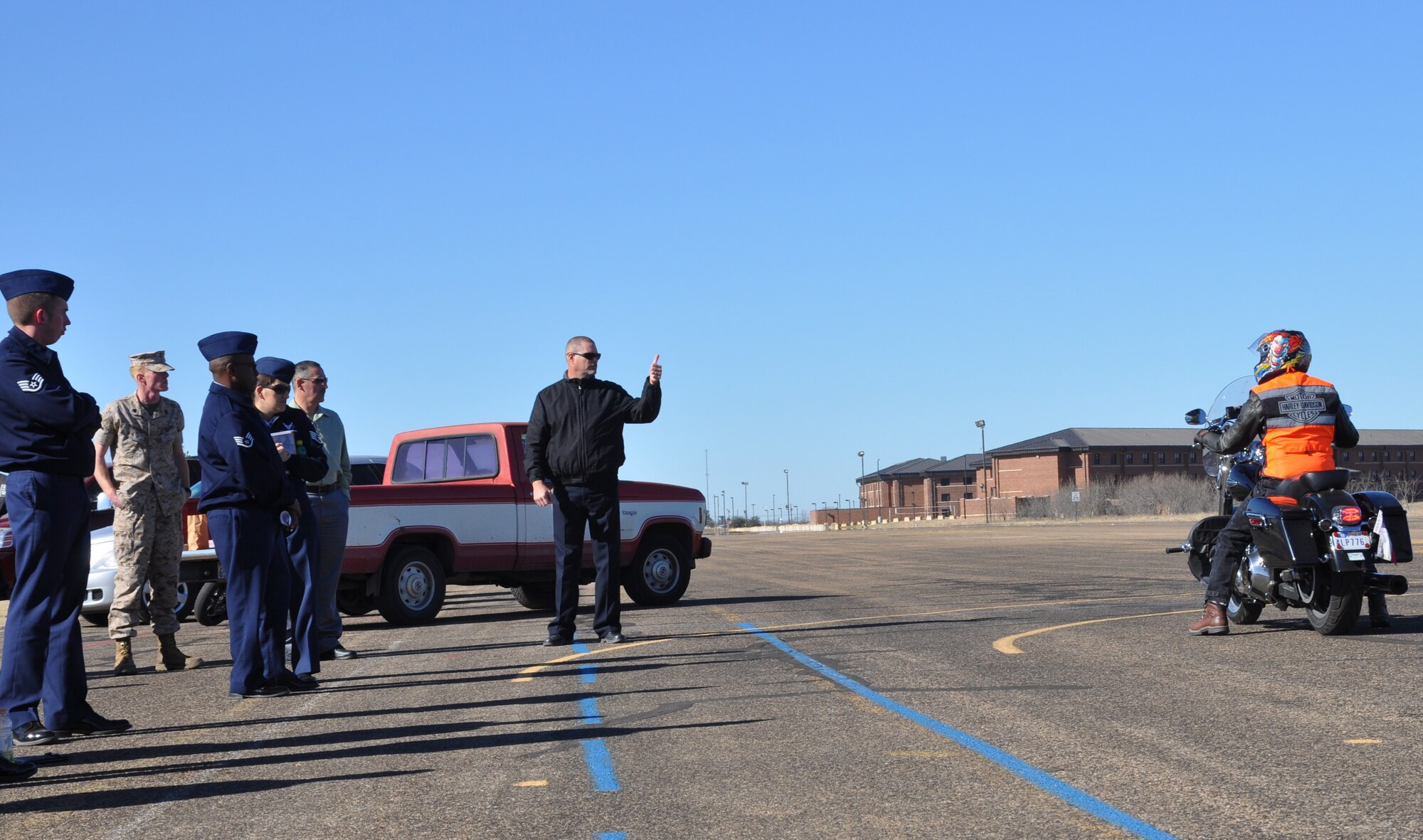 GOODFELLOW AIR FORCE BASE, Texas- Kevin Groff, 17th Training Wing Motorcycle Safety Foundation coach, quick-stops Reg Gordon, 17th Training Support Squadron training evaluator and Motorcycle Safety Foundation representative, during a MSF meeting on Kickapoo Trail here March 17. The meeting featured guest speaker Todd Deere, Texas Department of Transportation representative, and discussions on mishap trends for motorcyclists and training requirements and opportunities. (U.S.  Air Force photo/ Airman 1st Class Erica Rodriguez)