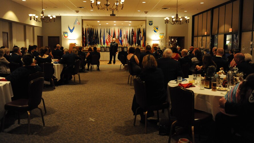 Retired Chief Master Sergeant Terry Savoie, speaks during the Chief Induction Ceremony March 14, 2014 at Dyess Air Force Base, Texas. Savoie was the guest speaker during the event, he touched on the importance of being a leader and the responsibilities that come with being a chief in the Air Force.  The Air Force ensures only the very best noncommissioned officers are promoted to rank of chief master sergeant. (U.S. Air Force photo by Airman 1st Class Autumn Velez/Released)