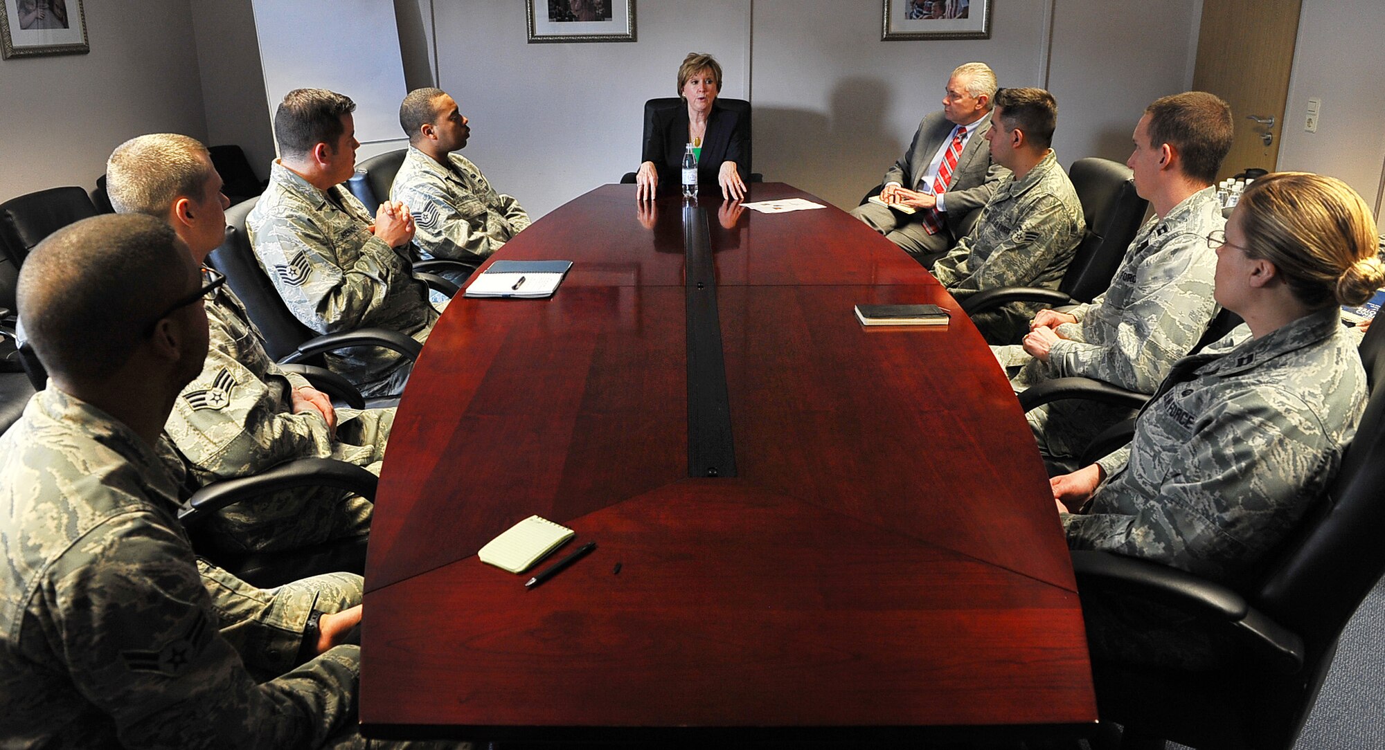 Dr. Susan Kelly, Transition to Veterans Program Office director, visits with Airmen to discuss the pros and cons of the Transition Assistance Program, March 17, 2014 at Ramstein Air Base, Germany. Kelly discussed advancing the Transition Assistance Program here and across the Department of Defense. (U.S. Air Force photo/Airman Dymekre Allen)