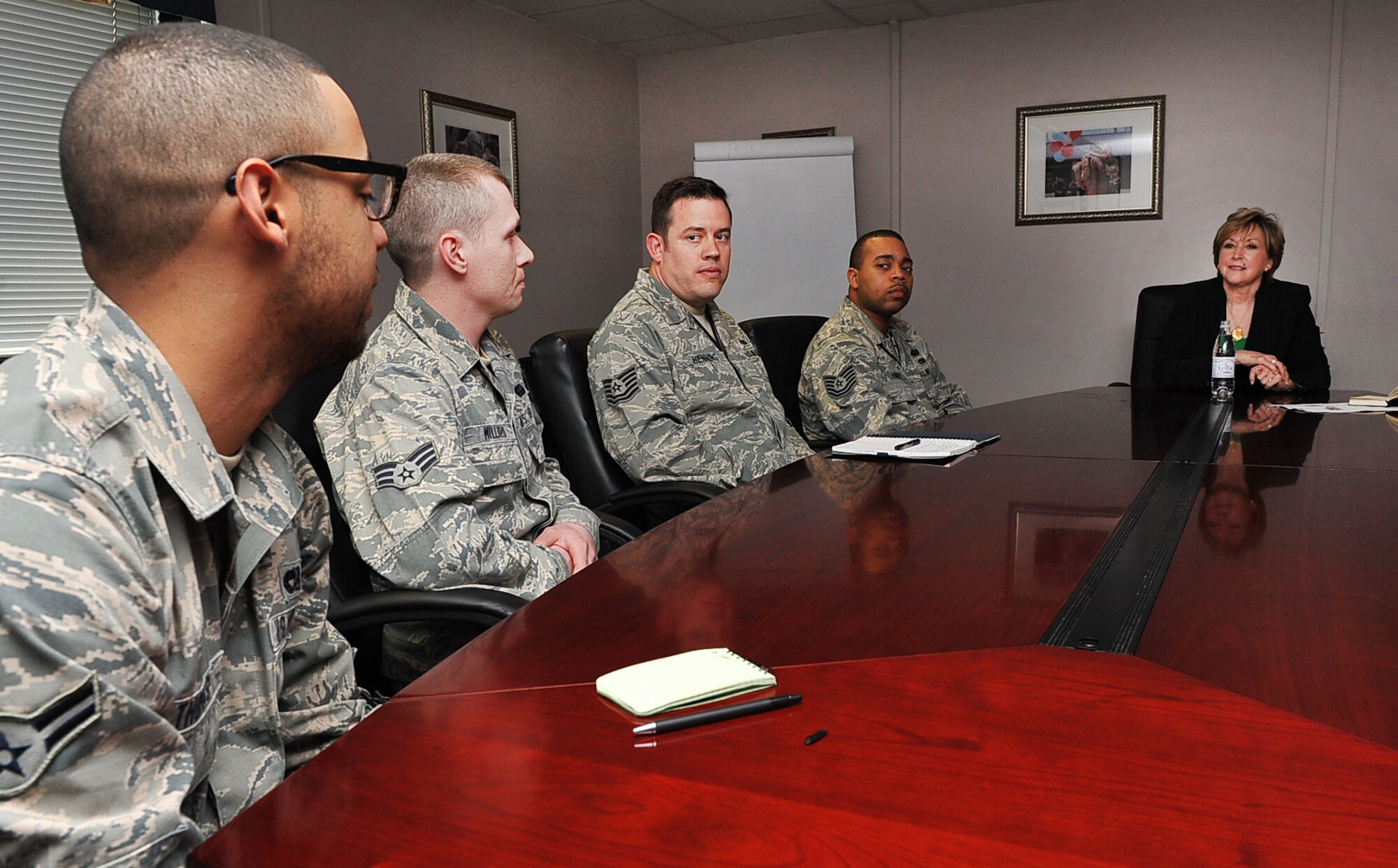 Dr. Susan Kelly, Transition to Veterans Program Office director, visits with Airmen to discuss the pros and cons of the Transition Assistance Program, March 17, 2014 at Ramstein Air Base, Germany. Kelly discussed advancing the Transition Assistance Program here and across the Department of Defense. (U.S. Air Force photo/Airman Dymekre Allen)