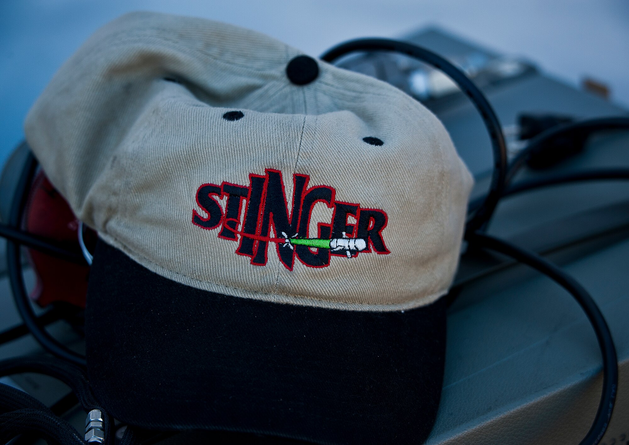 A Stinger Based Systems cap sits on a piece of equipment during the Army’s FIM-92 Stinger testing March 14 at Eglin Air Force Base, Fla.  SBS, a division of the Army’s cruise missile defense system unit, test-fired more than 30 Stingers at aerial and fixed targets on the base’s range throughout the week.  (U.S. Air Force photo/Samuel King Jr.)