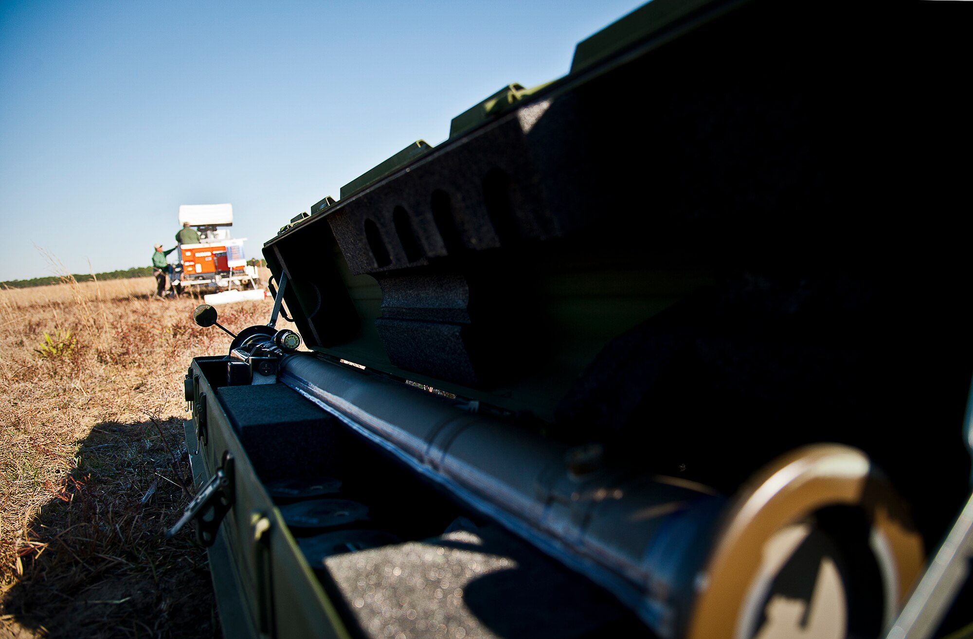 Members of the Redstone test team prepare the equipment as a FIM-92 Stinger waits to be fired March 14 at Eglin Air Force Base, Fla.  Stinger Based Systems, a division of the Army’s cruise missile defense system unit, test-fired more than 30 Stingers at aerial and fixed targets on the base’s range throughout the week.  (U.S. Air Force photo/Samuel King Jr.)