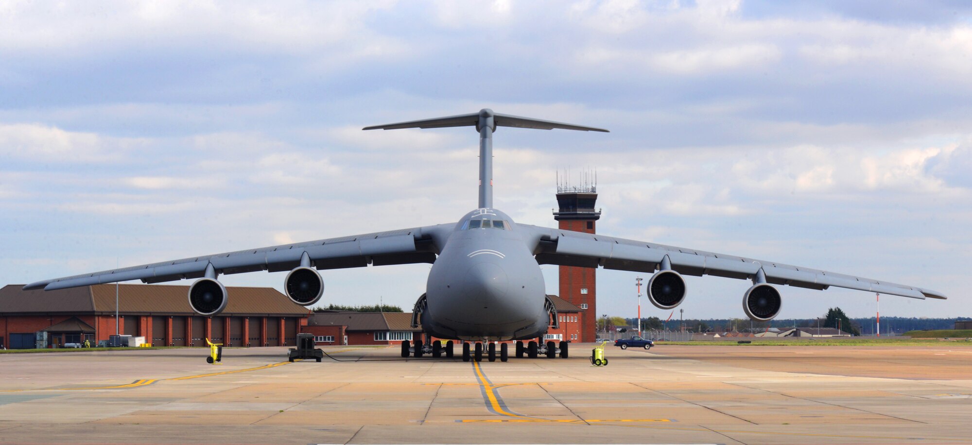 A C-5B Galaxy stationed at Westover Air Reserve Base, Mass., rests on the flightline March 17, 2014, on RAF Mildenhall, England. The C-5 brought Air Force Reserve members of the 310th Security Forces Squadron from Schriever Air Force Base, Colo., to RAF Mildenhall for a deployment to train with 100th SFS members. RAF Mildenhall hosts guard and reserve Airmen for deployments and training throughout the year. (U.S. Air Force photo by Airman 1st Class Dillon Johnston/Released) 