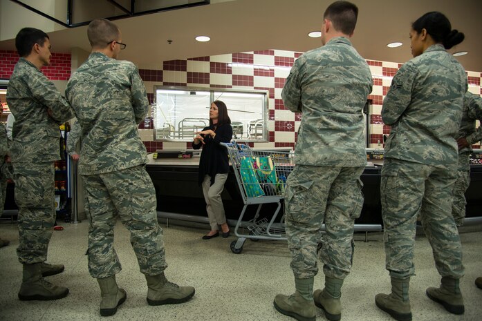 Wendy Wyatt, Health and Wellness Center dietitian, educates Airmen on healthy eating habits  March 13, 2014, at the Commissary on Joint Base Charleston – Air Base, S.C. Instead of physical training for the day, Airmen from the 628th Contracting Squadron learned about nutrition in an event  hosted by the HAWC, where they were informed on how to shop and eat healthier. (U.S. Air Force photo/ Airman 1st Class Clayton Cupit)