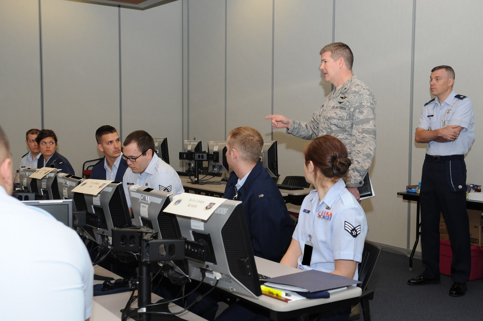 GOODFELLOW AIR FORCE BASE, Texas -- Brig. Gen. Scott George, National Security Agency Central Security Service deputy chief, talks to 315th Training Squadron students about the importance their training will have in the operational Air Force during a visit here March 10. George visited Goodfellow to tour the new Joint Intelligence Technical Training Facility. (U.S. Air Force photo/ Staff Sgt. Laura R. McFarlane)