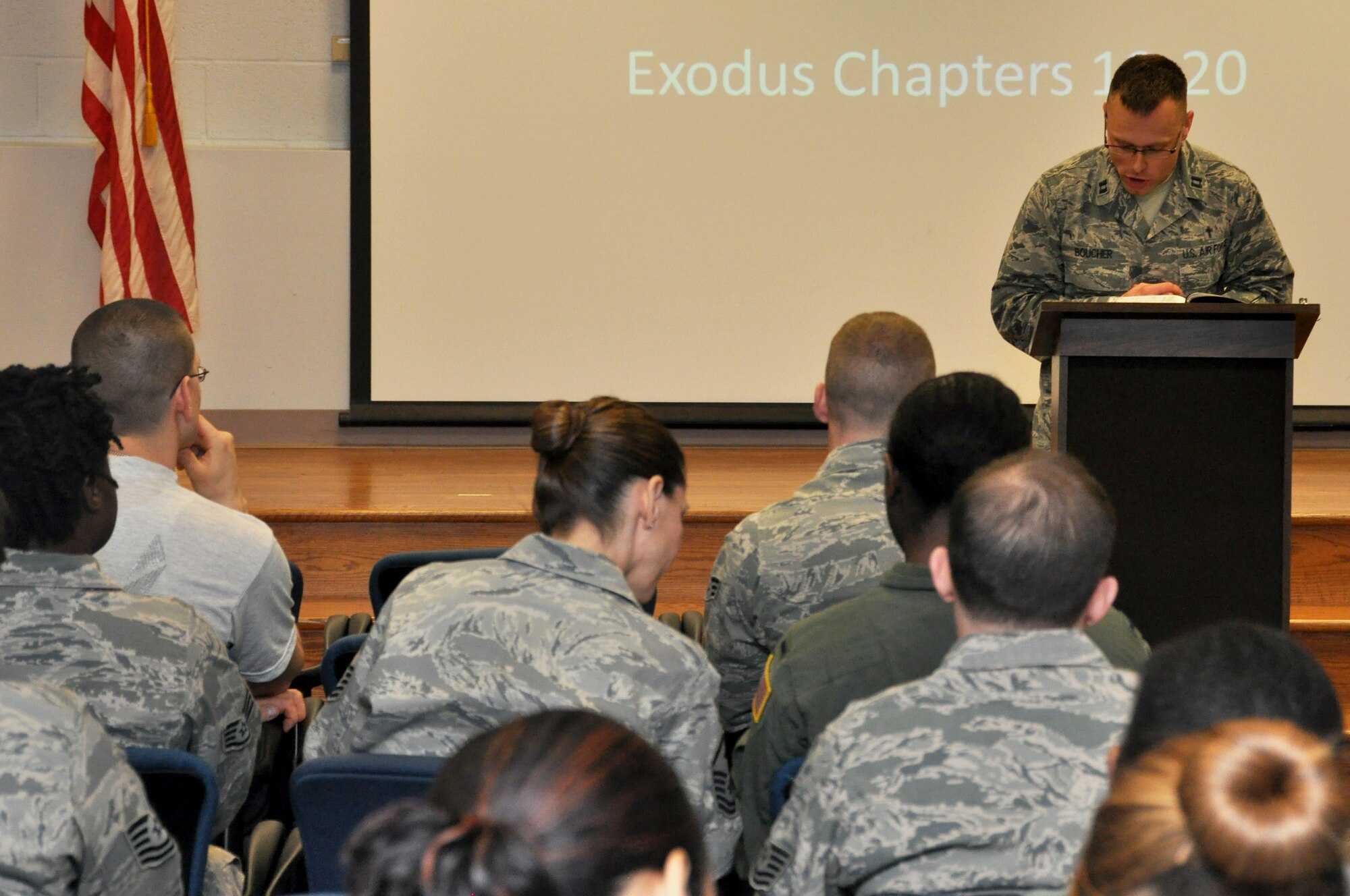 Chaplain Capt. Damon Broucher, a chaplain for the 459th Air Refueling Wing at Joint Base Andrews, Md., preaches to more than 40 members at the 459th Aeromedical Evacuation Squadron auditorium, March 16, 2014.  This year, the wing chaplains will talk about the Ten Commandments, focusing on a different commandment each month. (U.S. Air Force photo/ Staff Sgt. Brent Skeen) 