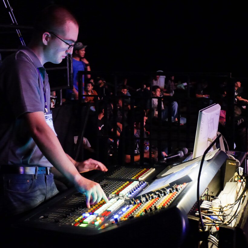 JAKARTA, Indonesia -- Staff Sgt. Josh Voyles, Band of the Pacifc-Asia audio engineer, mixes Pacific Clave' at the Java Jazz Festival in Jakarta, Indonesia on Mar. 1, 2014. Voyles's job is to deliver a well-balanced and intelligible mix to the audience. (Courtesy photo by Java Jazz Festival Production)
