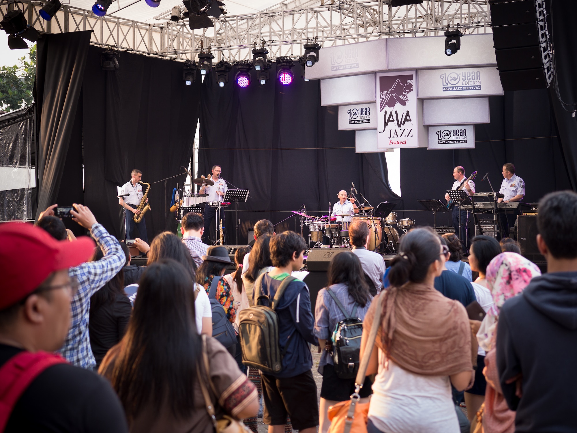 JAKARTA, Indonesia -- Pacific Clave', Band of the Pacific-Asia world-music ensemble, performs for a crowd of people at the Java Jazz Festival in Jakarta, Indonesia on Feb 28, 2014. Approximately 15 seperate stages provided simultaneous music and cultural exposure to the spectators. (U.S. Air Force photo by Staff Sgt. Josh Voyles)