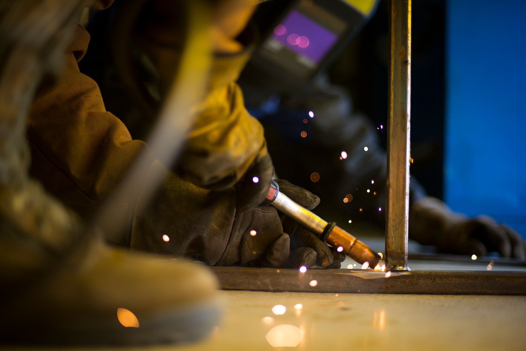 Airman 1st Class Jake Kohler, 374th Maintenance Squadron aircraft metals technology specialist, welds a section of a metal rack at Yokota Air Base, Japan, Mar. 18, 2014. (U.S. Air Force photo by Staff Sgt. Chad C. Strohmeyer/Released)