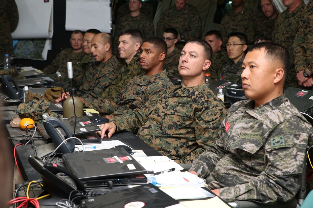 Republic of Korea and U.S. Marines take part in the Combined Marine Component Command exercise during Marine Expeditionary Force Exercise 2014 at the 1st ROK Marine Corps Division Base in Pohang, Republic of Korea March 18. The focus of MEFEX is to enhance interoperability and expeditionary command and control relationships between the U.S. Marine air-ground task force and the ROK Marine task force while honing the amphibious capabilities of each nation. MEFEX is a tribute to the maturity of the ROK-U.S. relationship and the combined ability to operate across the range of military operations. 