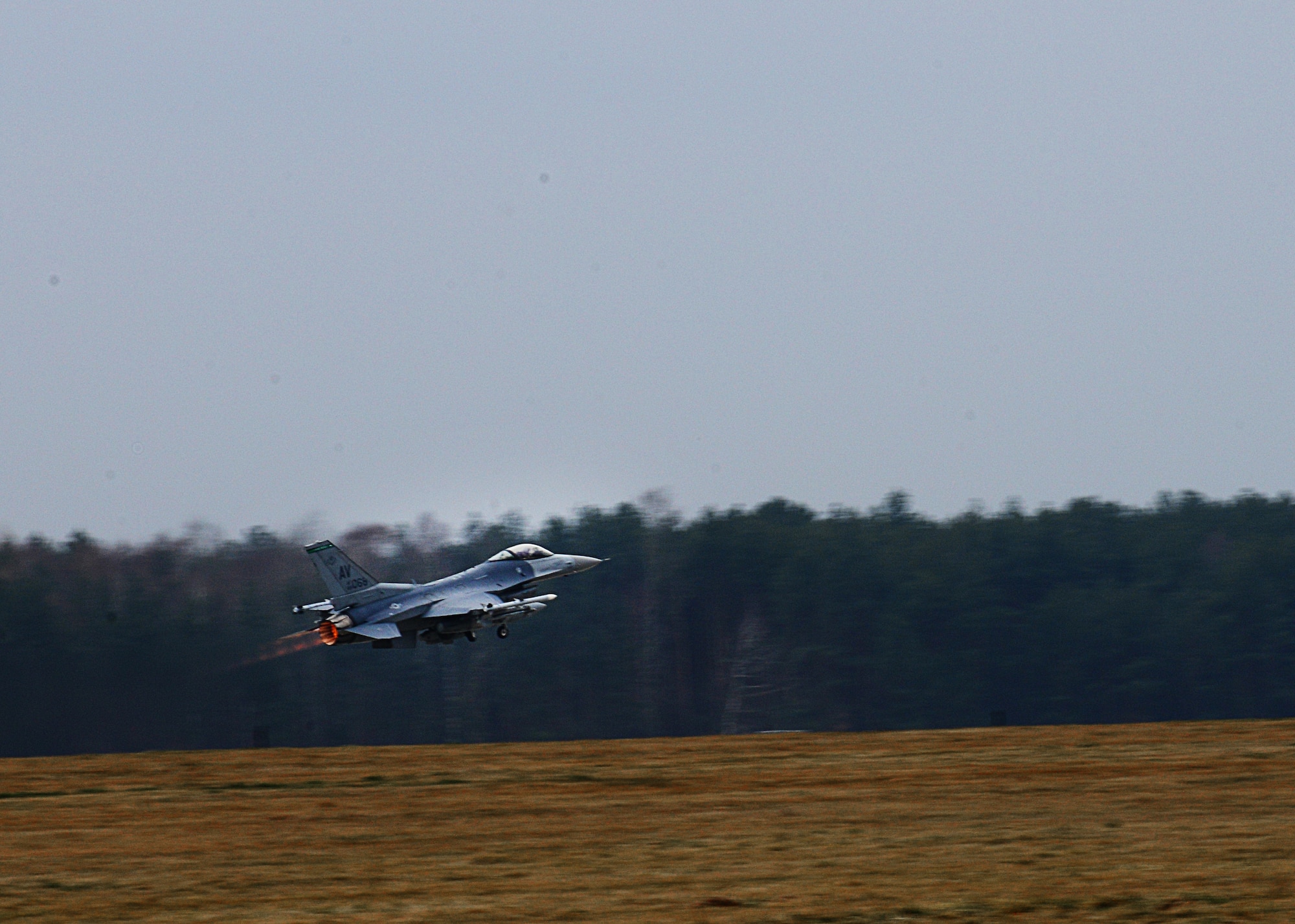 A 555th Fighter Squadron F-16 Fighting Falcon takes off for a training mission, March 18, 2014, at Lask Air Base, Poland. The aerial training exercises a pilot’s ability to operate across a range of military operations with precise full-spectrum capabilities. (U.S. Air Force photo/Airman 1st Class Ryan Conroy) 

