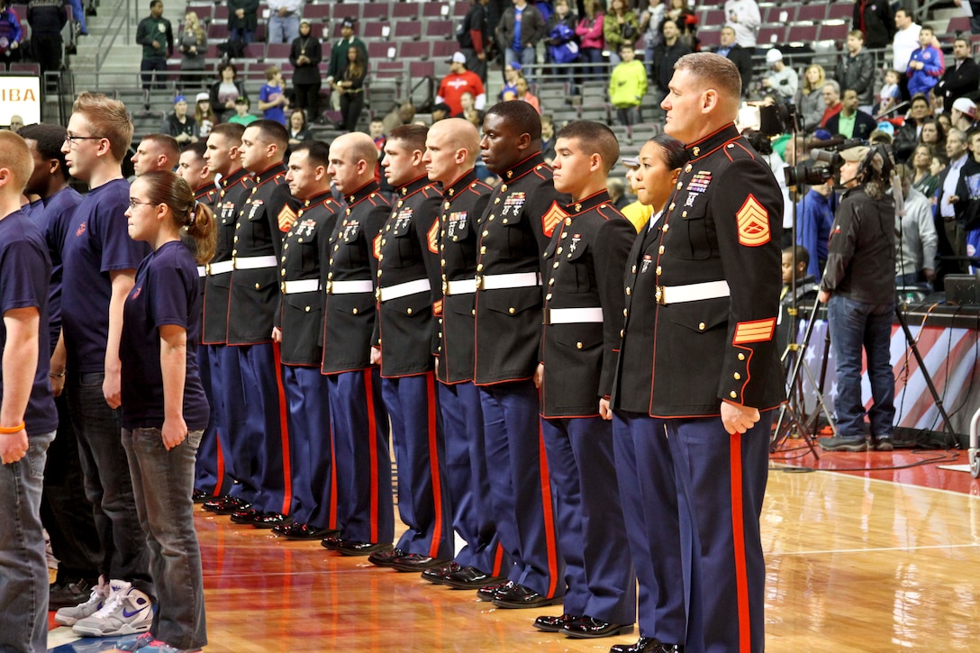 Marines with Recruiting Station Detroit stand at attention while more than 50 future Marines with Recruiting Substations Pontiac and Richmond, stand at attention and recite the oath of enlistment during pre-game ceremonies for the Detroit Pistons at The Palace of Auburn Hills, Mich., Feb. 24, 2014. Marine Capt. Michael Gangemella, Marine Corps
Recruiting Station Detroit executive officer and native of Wilmington, Del., swore in the future Marine recruits with Recruiting Sub-Stations Pontiac and Richmond. (US Marine Corps photo by Sgt. Elyssa Quesada/Released)
