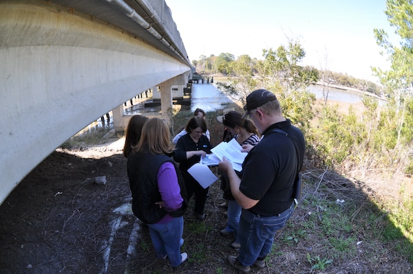 SAVANNAH, Ga. – Representatives from the U.S. Army Corps of Engineers, the Georgia Department of Transportation the Federal Highway Administration, the National Oceanic and Atmospheric Administration (NOAA) Fisheries, and the U.S. Fish and Wildlife Service discussed preliminary environmental mitigation plans for a proposed bridge replacement project on the Islands Expressway, Feb. 28, 2014. The proposed project would build a new, larger bridge to replace the existing bridge that crosses the Wilmington River on the Atlantic Intracoastal Waterway. It would require permits from multiple state and federal agencies, including the Corps' Savannah District Regulatory Division. Since the project is still in the very preliminary design phase, the meeting brought together regulators from multiple agencies to discuss potential environmental mitigation issues early on in the process. The Corps' Regulatory Division evaluates permit applications from developers, communities and private citizens who plan construction or excavation near streams and wetlands in the state of Georgia. With any permitting project, the Corps first aims to avoid, then minimize, and lastly, compensate for environmental impacts to aquatic resources. USACE photo by Tracy Robillard.