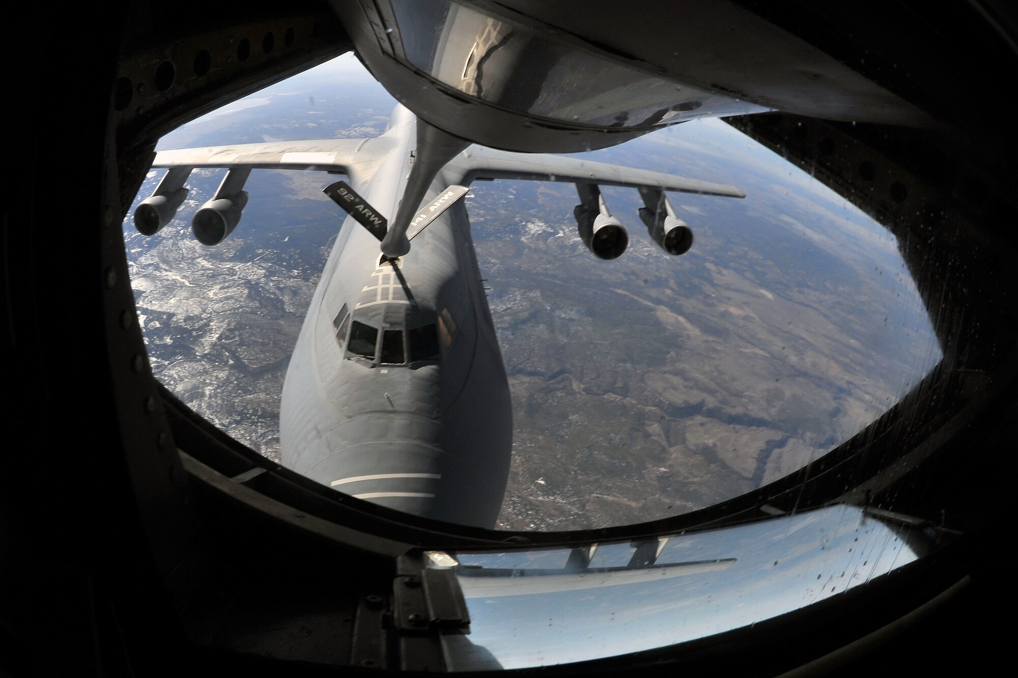 A KC-135 Stratotanker from Fairchild AFB, Wash., refuels a C-5 Galaxy from Travis Air Force Base, Calif., during a refueling mission March 13, 2014. The flight was an all-female mission held to honor and commemorate Women’s History Month. (U.S. Air Force photo by Staff Sgt. Veronica Montes/Released)